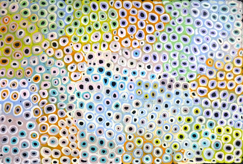 Large pastel coloured Soakage painting by Lena Pwerle with circles