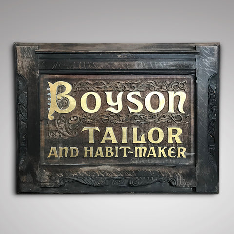 Dated 1897, a large late 19th century carved oak shop sign for Boyson, Tailor and Habit Maker