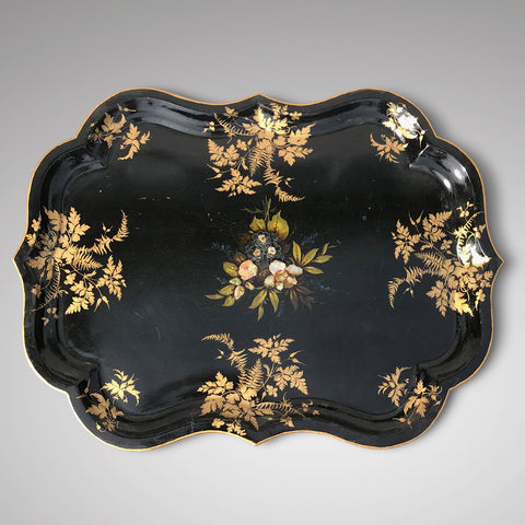  A 19th century papier mache tray dating c. 1880 with black lacquered background