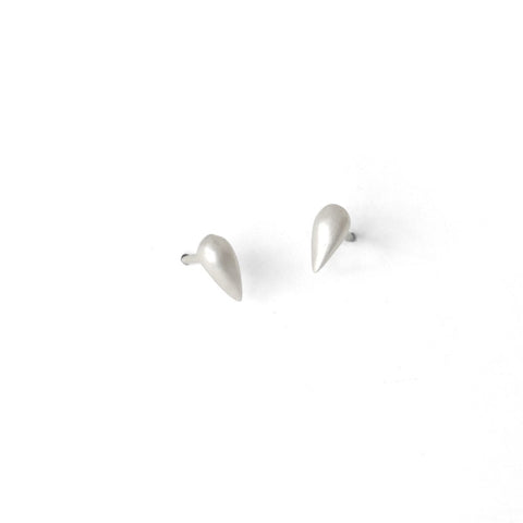For a modern, sculptural take on the classic teardrop stud, take a look at our Pod Studs, which make great earrings for new piercings.
