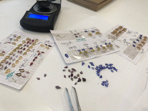 These geometric gemstones, ranging from blue-violet tanzanite to ruby red spinel, are shown on paper as Marion arranged them for the Fall/Winter 2018 Collection.