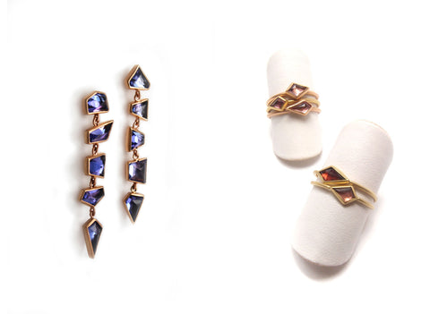 Geometric gemstones become one-of-a-kind designer jewelry in the Fall/Winter 2018 Collection from Marion Cage. For example, these Geo Tanzanite Dangle Earrings feature 18k rose gold with blue-violet tanzanite stones, and these Geo Spinel Stacking Rings in 18k rose gold feature pale pink spinel stones.