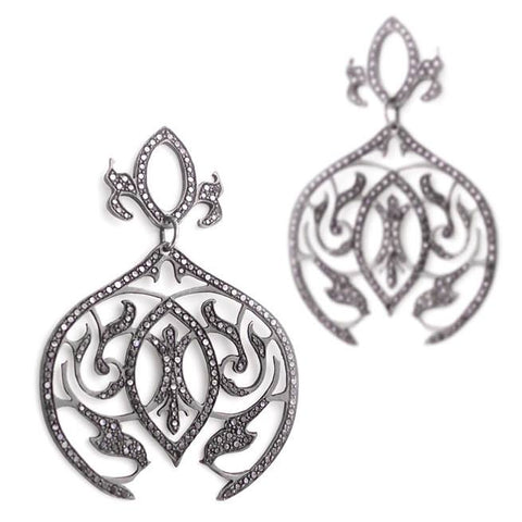 The dark gunmetal gray of black rhodium plating in these Arabesque Dangle Earrings feels cool and edgy, while the sparkle of the black pave diamonds becomes more subtle.