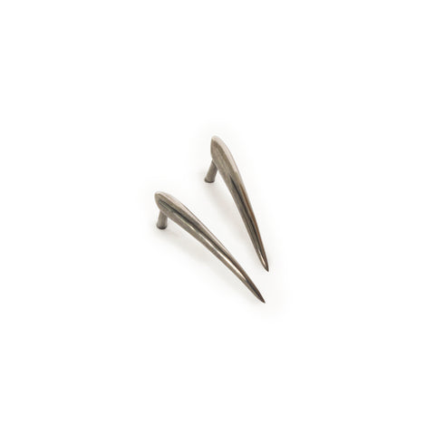 These Ankole Studs in black rhodium plated sterling silver and any other black rhodium jewelry from Marion Cage can be replated at our gallery free of charge.