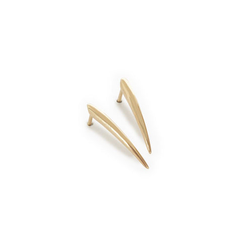 Once you start transitioning to regular earrings, you want something timeless that you can wear day and night. Enter the Ankole Studs from Marion Cage, one of our best earrings for new piercings.