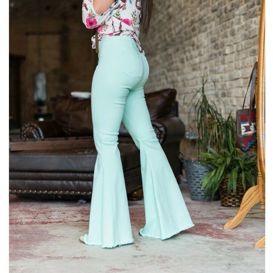 green flare jeans