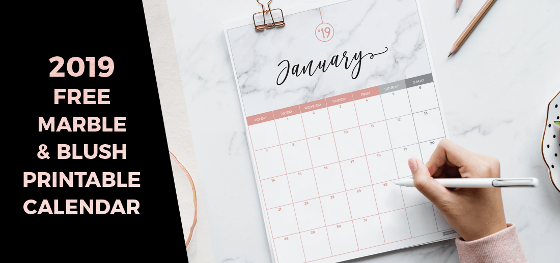 marble & blush printable calendar attached to a clip board