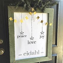 Christmas Words personalized print framed and hanging on a Christmas decorated door