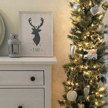 Reindeer personalized print in a Christmas decorated bedroom 