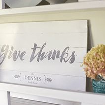 Give Thanks personalized print displayed in a farmhouse dining room