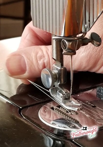 Hold thread tails on a Singer Featherweight