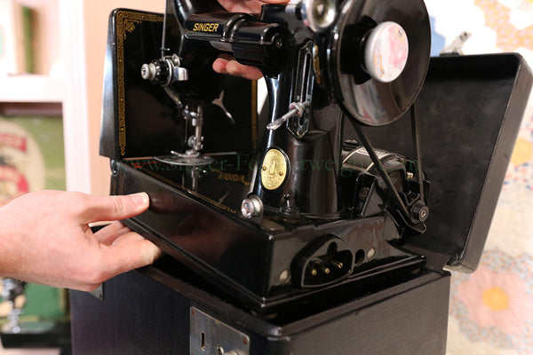 Inserting the Singer Featherweight in its Case
