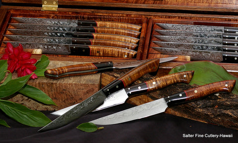 Handmade steak knife set with decorative options of long ebony bolster and red accents