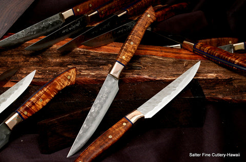 Custom steak knife set with hammered blades and mokume metal bolsters