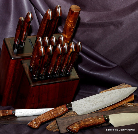 Large chef knife set with Mozambique ebony short bolsters, red accents and one decorative mosaic pin