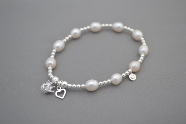 silver bead bracelet with heart charm