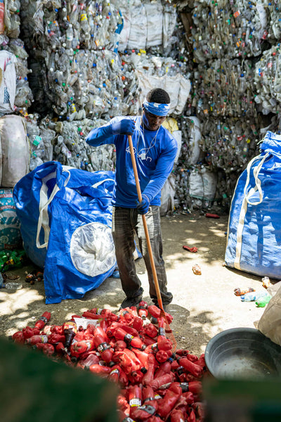 4ocean Haiti Crew Sorting Plastic
