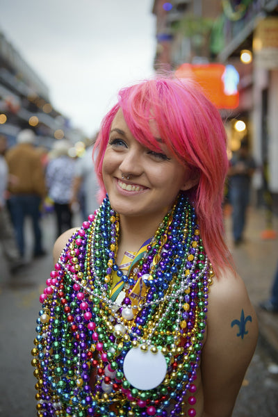 Plastic Mardi Gras Beads on Women's Neck