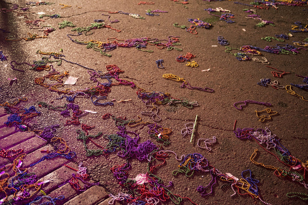 Plastic Mardi Gras Beads on the Street 