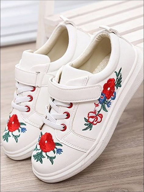 white sneakers with flower embroidery