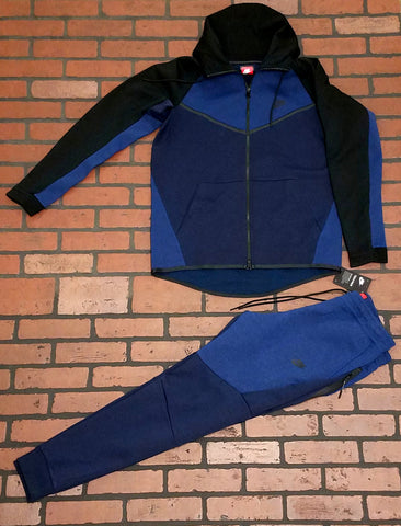 blue and black nike tech suit