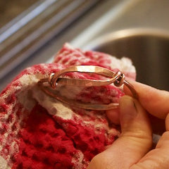 Wipe jewelry dry with a rag