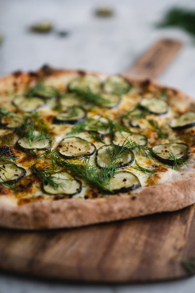 dill pickle pizza, pizza peel, pickle pizza, dill pizza, pizza craft