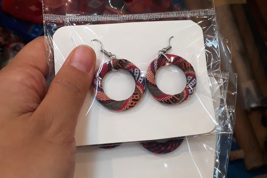 Yakan weave earrings from the Philippines by weaver Evelynda Otong at the 2019 Likhang Habi Market Fair in Manila, Philippines.