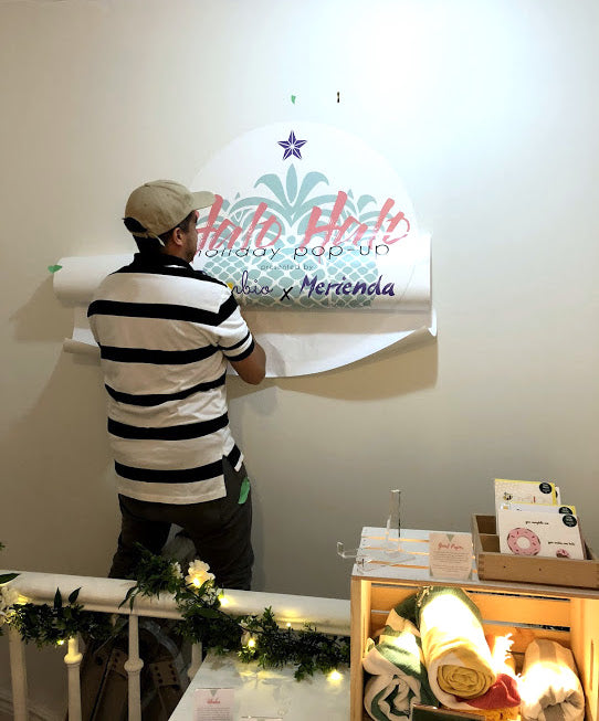Installation of our sign - Halo Halo Holiday Pop-Up