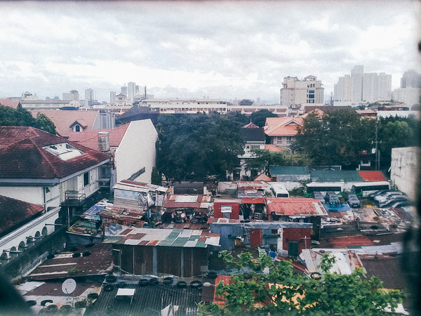 The roofs of communities lined with the roofs of preserved Spanish houses in Intramuros, Manila
