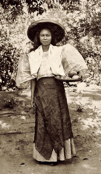 A Filipina again looking elegant while working in traditional dress