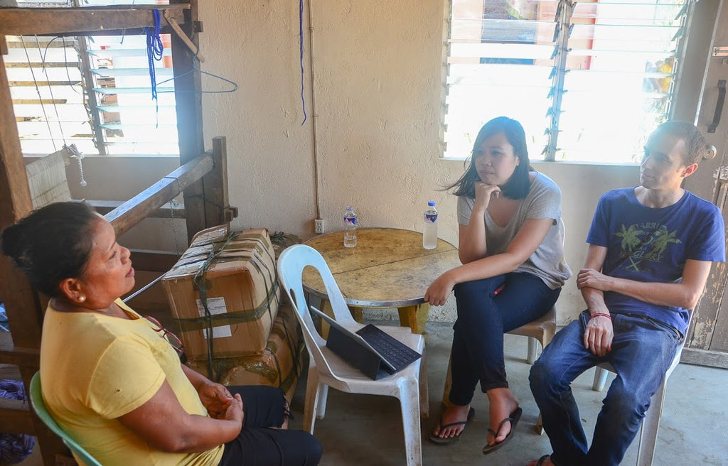 Us (Gelaine and Jérôme) speaking with Mary Jane, one of our AKABA weavers in Ilocos Norte