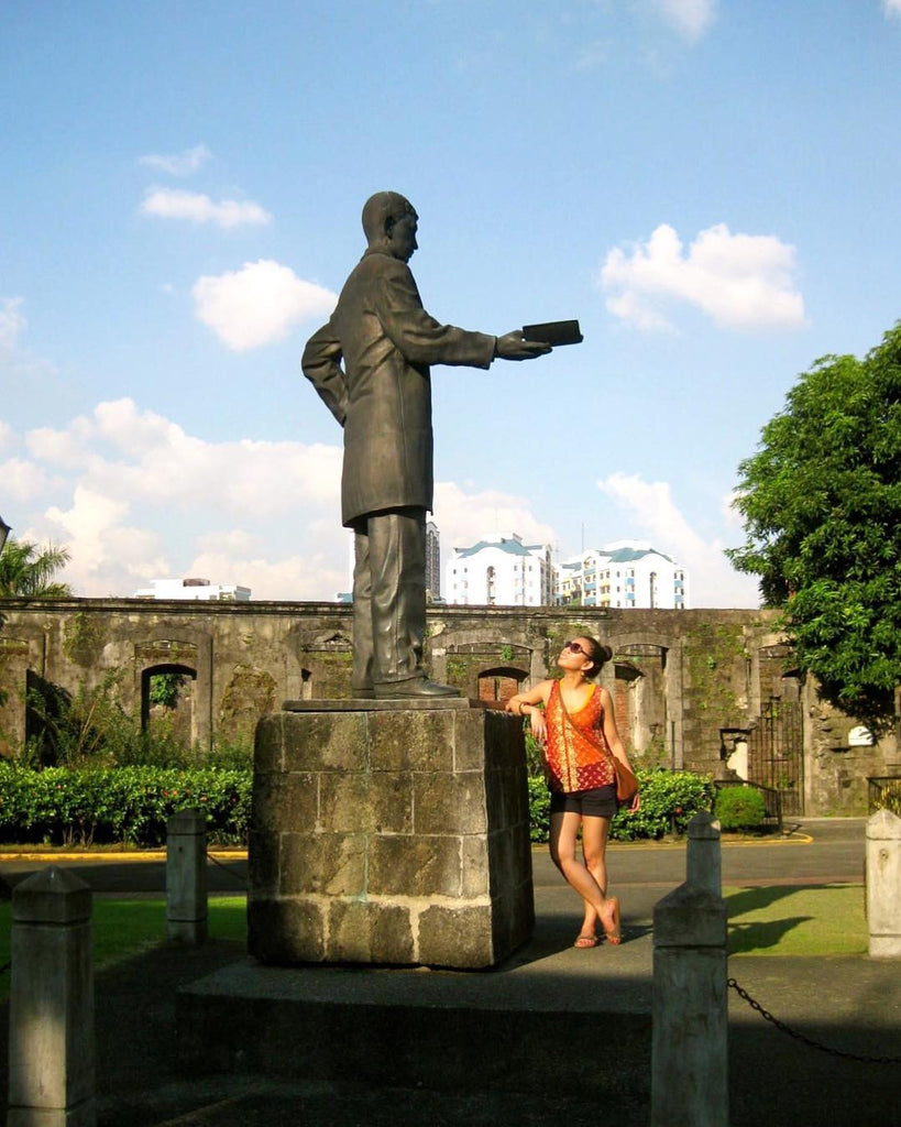 Intramuros looking up at a statue of José Rizal