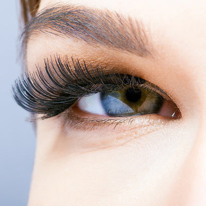 Picture of a women with long eyelashes.