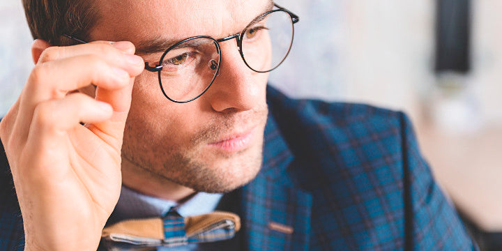 Valentines day date dress nice with bow tie man with round prescription glasses 