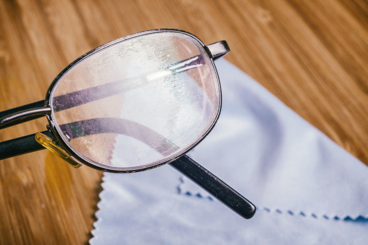 Old prescription glasses with scratches