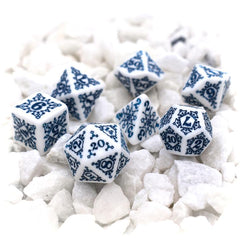 White dice with blue numbers and snowflakes