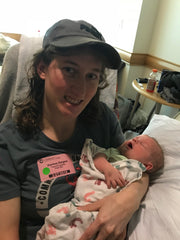 Mom holding her baby in the NICU