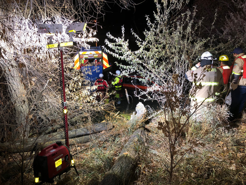 A Lentry Lighting System allows everyone to see and be safe while hooking up a partially submerged vehicle to be pulled out of the water.