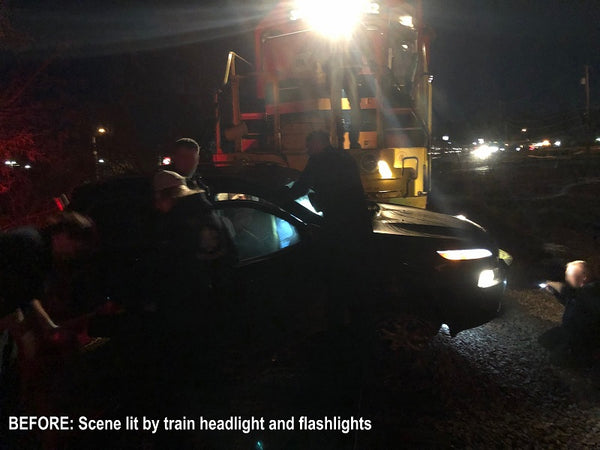 Before picture of a train vs. car accident in the dark