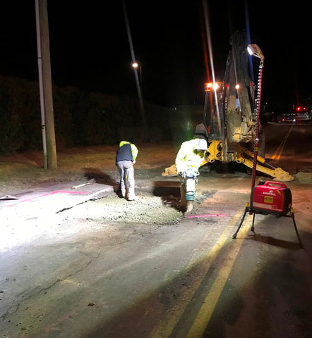 Road work done at night with the help of Lentry Model 2SPECX