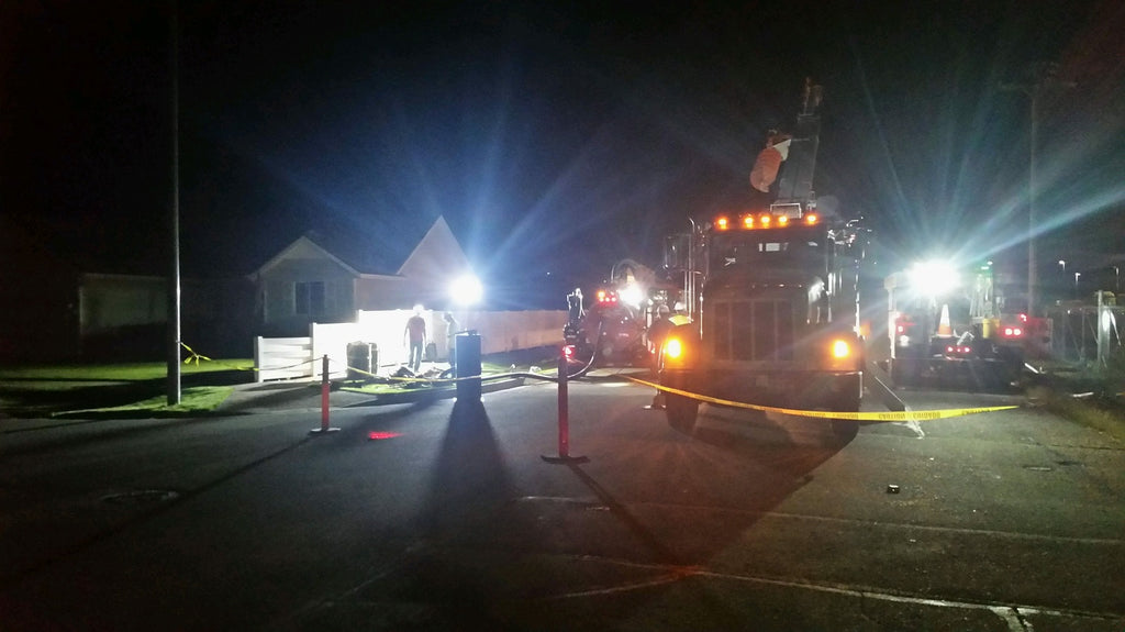 Lentry Model 1SPECX lighting a neighborhood job site at night