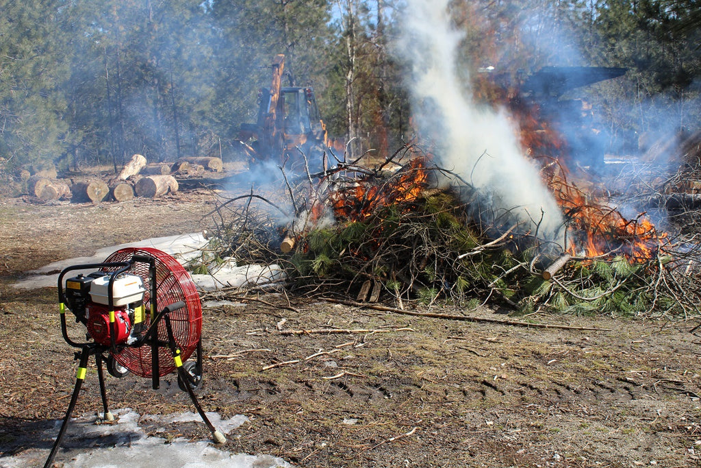 Starting a brush pile burning with a Ventry Fan