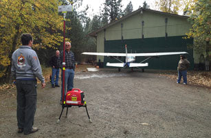 Above: James, Ken, John and Sara prep for testing.