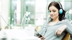 Girl with headphones and mobile