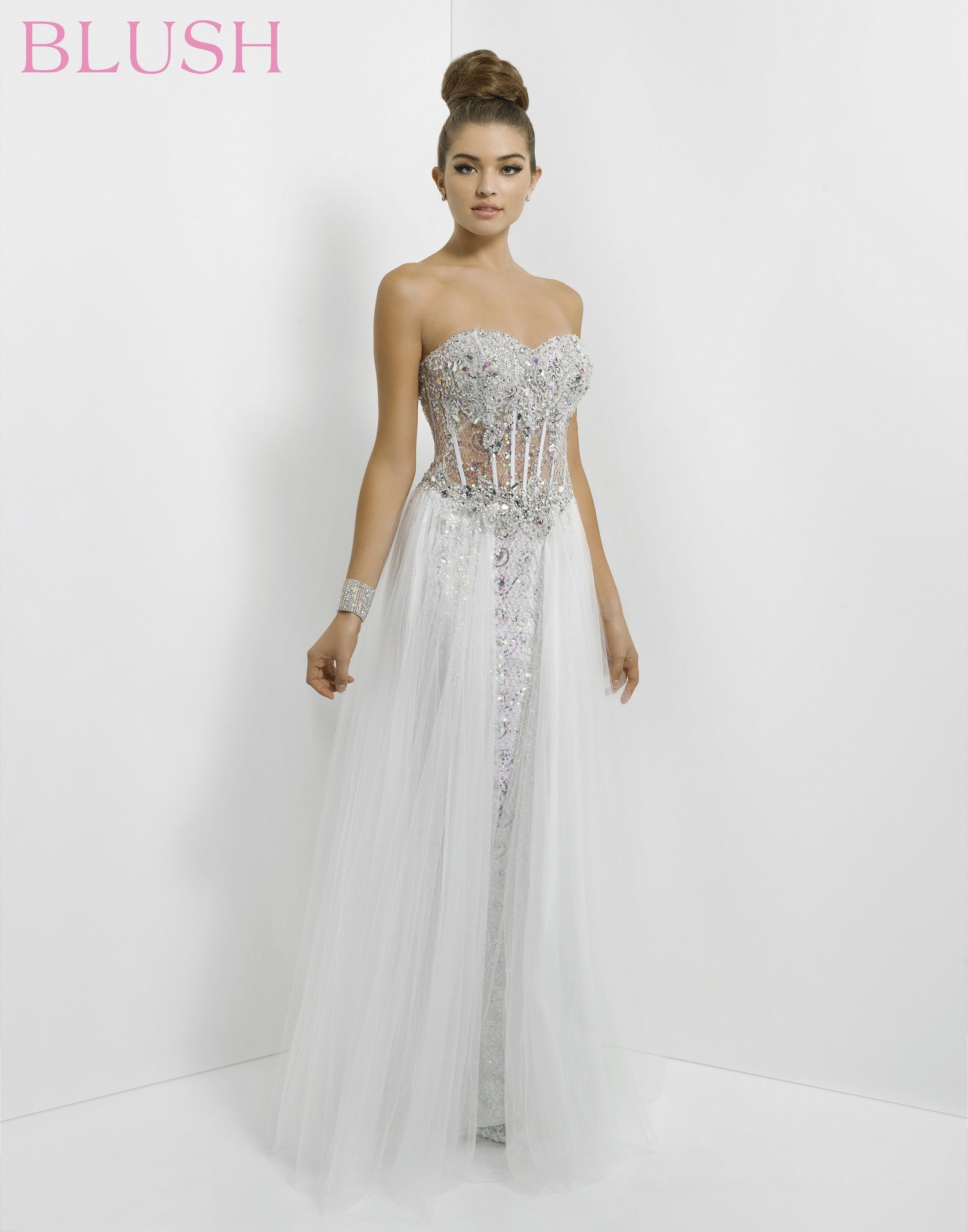 Strapless Figure-Flattering Crystal Embellished Gown With Corset-Like Top And Puffy Skirt Finish
