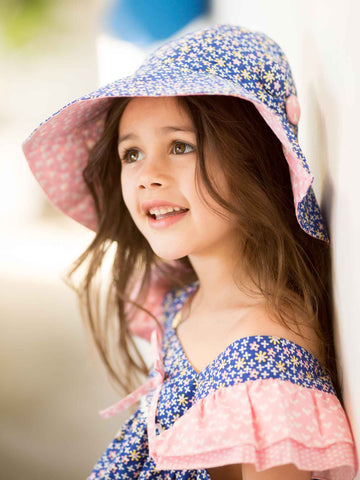 Girl in a blue flower hat