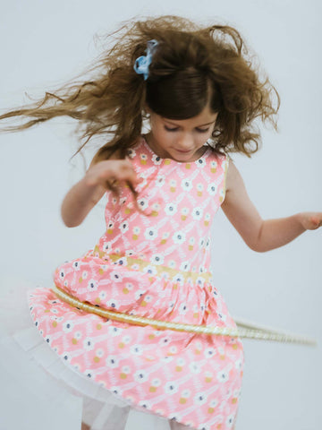 Girl in a pink flower dress