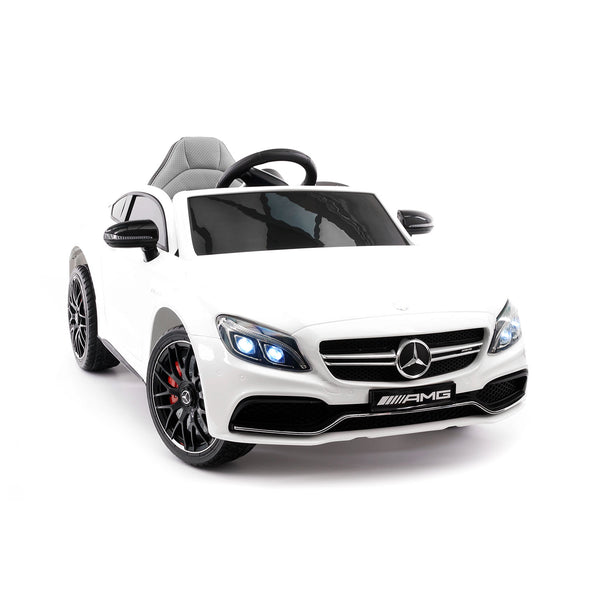 white mercedes baby car