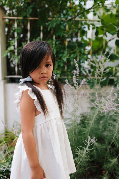 Linen pinafore dress in Ivory.